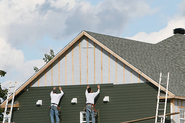 Professional Emergency Siding Repair technician working in Upper Sandusky, OH